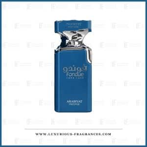 Flacon de parfum Fondue Lava Lush d'Arabiyat Prestige, eau de parfum mixte 100 ml, flacon bleu petrole a coulee metallique argentee