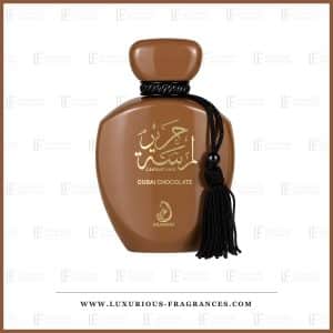 Flacon de parfum Lamsat Harir Dubai Chocolate d'Arabiyat Prestige, eau de parfum mixte 100 ml, flacon marron chocolat a pompon noir