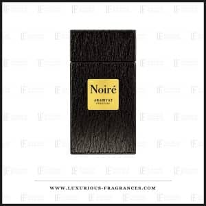 Flacon de parfum Noire d'Arabiyat Prestige, eau de parfum masculine 100 ml, flacon noir texture facon ecorce a plaque doree